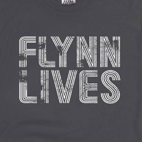 Close-up of 'FLYNN LIVES' striped logo on dark gray crewneck T-shirt